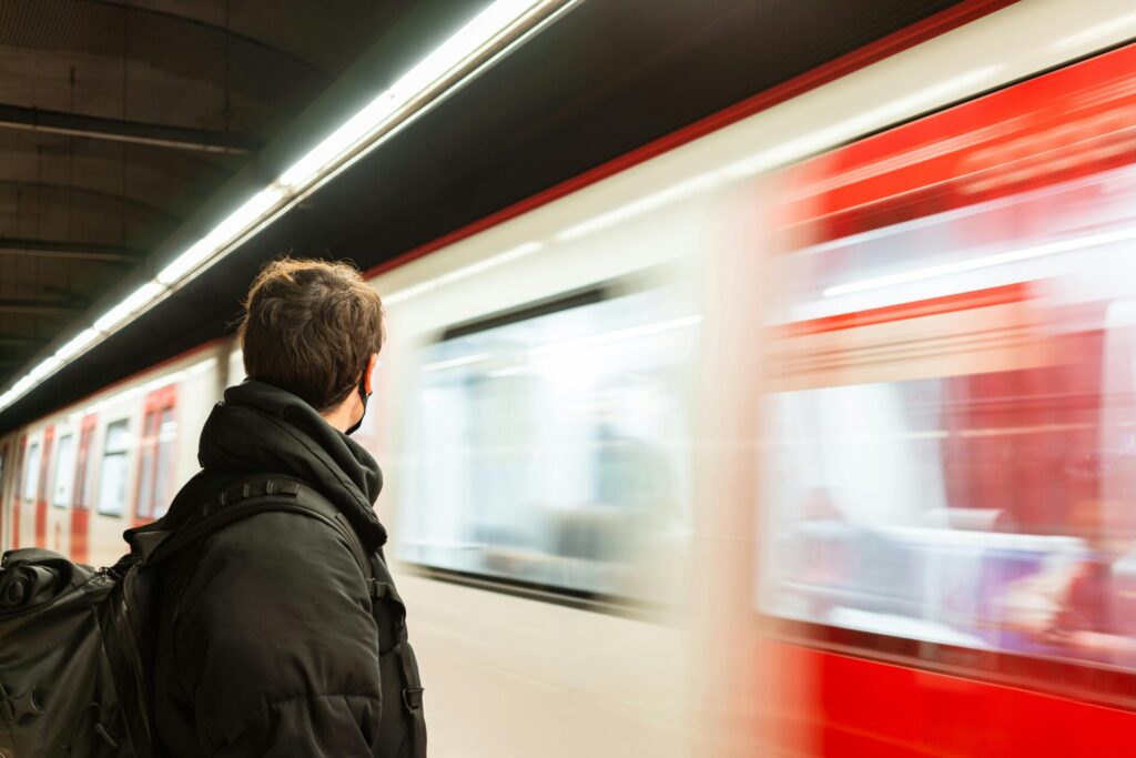 a man near a moving train